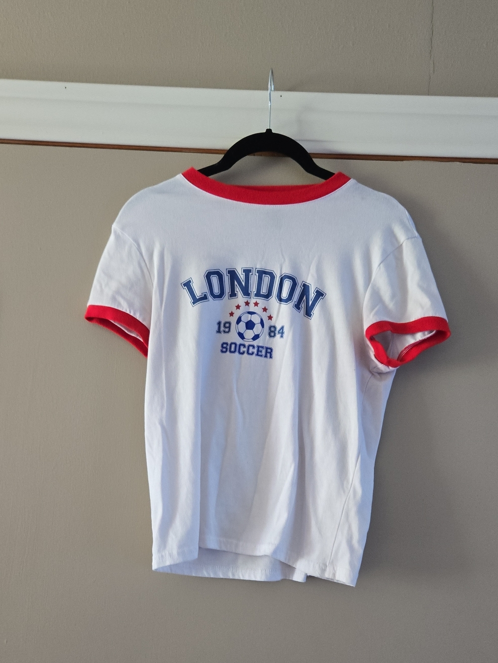 Charlotte Russe White Tee with Red Trim and Blue London Soccer Graphic